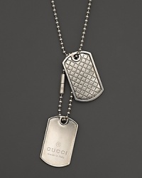 Aged sterling silver dogtags with classic Gucci logo. Aged sterling silver dogtags with classic Gucci logo.