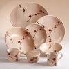 Desert Flowers 16-piece place setting. Features four of each: dinner plate, salad plate, cereal bowl and mug.
