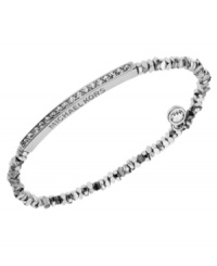 Stackable styles a must! Michael Kors' chic stretch bracelet pairs perfectly with bangles or bracelets. Beads and bar accent are crafted in silver tone mixed metal and accented by pave-set glass accents. Approximate diameter: 2-1/4 inches. Approximate width: 1/8 inch. Stackable styles a must! Michael Kors' chic stretch bracelet pairs perfectly with bangles or bracelets. Beads and bar accent are crafted in silver tone mixed metal and accented by pave-set glass accents. Approximate diameter: 2-1/4 inches. Approximate width: 1/8 inch.