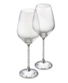 Make it a memorable dining experience with Swarovski Crystalline wine glasses. A faceted base, polished metal accents and stems filled with glittering chatons turn an ordinary meal into cause for celebration.