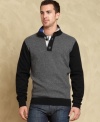 This mock neck sweater from Tommy Hilfiger is an easy-to-pair addition to your seasonal look.