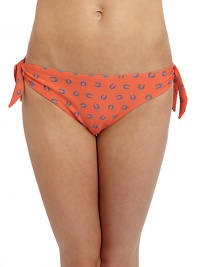 THE LOOKHorseshoe printElastic waist and leg openingsDecorative side ties with knot detailsTHE MATERIAL80% nylon/20% spandexFully linedCARE & ORIGINHand washImportedPlease note: Bikini top sold separately. THE LOOKHorseshoe printElastic waist and leg openingsDecorative side ties with knot detailsTHE MATERIAL80% nylon/20% spandexFully linedCARE & ORIGINHand washImportedPlease note: Bikini top sold separately.