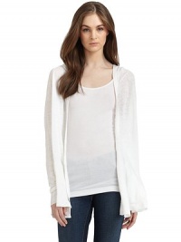 THE LOOKLong sleevesOpen frontPatch pockets at waistBanded, ribbed cuffs and hemAttached hoodLightweight knitTHE FITAbout 28 from shoulder to hemTHE MATERIALLinenCARE & ORIGINDry cleanImportedModel shown is 5'8½ (174cm) wearing US size Small. THE LOOKLong sleevesOpen frontPatch pockets at waistBanded, ribbed cuffs and hemAttached hoodLightweight knitTHE FITAbout 28 from shoulder to hemTHE MATERIALLinenCARE & ORIGINDry cleanImportedModel shown is 5'8½ (174cm) wearing US size Small.