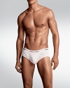 Cotton stretch hip briefs with body defining fit. Elasticized waist band with logo, pouch front.