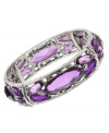 Slip on pretty purple hues. This stretch bracelet by 2028 features captivating amethyst plastic beads and simulated marcasite. Crafted in silver tone mixed metal. Stretches to fit wrist. Approximate length: 7 inches.