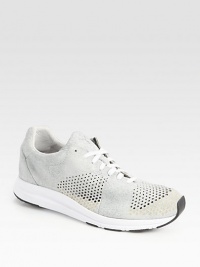 Classic sporty sneaker is reinvented with perforated details set in soft, supple leather.Leather upperPadded insoleRubber soleImported Classic sporty sneaker is reinvented with perforated details set in soft, supple leather.Leather upperPadded insoleRubber soleImported