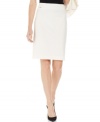Bold white updates the classic pencil skirt silhouette for a fresh look that works any time of year. From Calvin Klein.