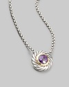 From the Color Classic Collection. A swirled sterling silver cookie pendant, with a faceted center of radiant amethyst, on a bold box chain. Amethyst Sterling silver Chain length, about 16 Lobster clasp Imported