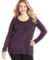 Let your look shine with Debbie Morgan's plus size sweater, accented by an embellished front.