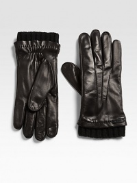A cold weather favorite, shaped in rich Italian leather with a cashmere lining and a ribbed-knit trim.About 10 longCashmere linedLeatherDry cleanMade in Italy
