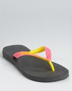 Contrasting colors take center stage on havaianas's Top Mix flip flops.