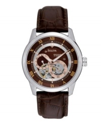 Rich, saturated hues combine on this self-winding watch by Bulova. Brown croc-embossed leather strap and round stainless steel case. Brown dial with textured inner dial features silver tone inner ring, gold tone Roman numerals at markers, rose-gold tone stick indices, rose-gold tone and silver tone subdials and logo. Automatic movement. Water resistant to 30 meters. Three-year limited warranty. Rich, saturated hues combine on this self-winding watch by Bulova. Brown croc-embossed leather strap and round stainless steel case. Brown dial with textured inner dial features silver tone inner ring, gold tone Roman numerals at markers, rose-gold tone stick indices, rose-gold tone and silver tone subdials and logo. Automatic movement. Water resistant to 30 meters. Three-year limited warranty.