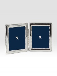 EXCLUSIVELY AT SAKS.COM. Sleek and sophisticated in gleaming silverplate finished with beaded edging.Silverplate and woodChoose from 2 X 3, 4 X 6 or 5 X 7Imported EXCLUSIVELY AT SAKS.COM. Sleek and sophisticated in gleaming silverplate finished with beaded edging.Silverplate and woodChoose from 2 X 3, 4 X 6 or 5 X 7Imported
