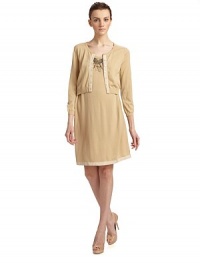 Indulgently soft virgin wool from Italy shapes this one-piece dress with an intricately beaded neckline for a hint of glam.Ribbed crew neckline with beadwork Button front mock cardigan Ribbon lined placket Long sleeves with ribbed cuffs Ribbon trimmed hem About 34 from shoulder to hem Virgin wool Hand wash or dry clean Made in Italy Indulgently soft virgin wool from Italy shapes this one-piece dress with an intricately beaded neckline for a hint of glam.Ribbed crew neckline with beadwork Button front mock cardigan Ribbon lined placket Long sleeves with ribbed cuffs Ribbon trimmed hem About 34 from shoulder to hem Virgin wool Hand wash or dry clean Made in Italy