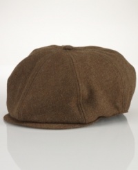 A classic vintage-inspired newsboy cap is rendered in soft tweed, adding a dose of heritage style to any ensemble. A classic vintage-inspired newsboy cap is rendered in soft tweed, adding a dose of heritage style to any ensemble.