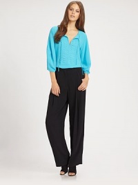 Delicate eyelet trim and applique pleats transform this simple viscose blouse into an elegant wardrobe staple.Tie-front split V necklineGathered three-quarter sleevesEmbellished front yokeStraight hemAbout 25 from shoulder to hem55% viscose/45% rayonDry cleanImportedModel shown is 5'11 (180cm) wearing US size 4. Delicate eyelet trim and applique pleats transform this simple viscose blouse into an elegant wardrobe staple.Tie-front split V necklineGathered three-quarter sleevesEmbellished front yokeStraight hemAbout 25 from shoulder to hem55% viscose/45% rayonDry cleanImportedModel shown is 5'11 (180cm) wearing US size 4.