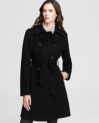 This belted DKNY trench coat gets an update from elegant seaming detail for a modern look to meet the new season. This belted DKNY trench coat gets an update from elegant seaming detail for a modern look to meet the new season.
