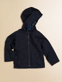 Delivering two outstanding looks in one package, this reversible topper has an attached hood, plenty of pockets and can be switched from check to solid to suit any mood.Attached hoodLong sleeves with button tab cuffsFull-zip frontAngled pocketsElastic hem63% cotton/37% nylonMachine washImported