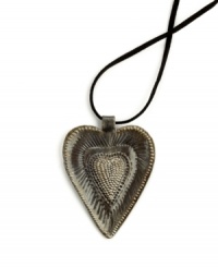So much to love. The Radiant Heart pendant is full of rich textured detail, hand-cut and hammered in recycled steel by artisans determined to rebuild their lives. After two coats of varnish, each is dried in the hot Caribbean sun. Wear it yourself or give to someone special. So much to love. The Radiant Heart pendant is full of rich textured detail, hand-cut and hammered in recycled steel by artisans determined to rebuild their lives. After two coats of varnish, each is dried in the hot Caribbean sun. Wear it yourself or give to someone special.