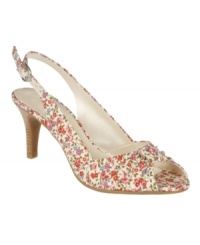 Perfectly professional, classically casual. The Osbert pumps by Etienne Aigner are a timeless pump with a trendy slingback and darling peep-toe for a versatile look. Perfectly professional, classically casual. The Osbert pumps by Etienne Aigner are a timeless pump with a trendy slingback and darling peep-toe for a versatile look.