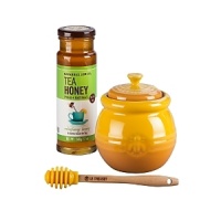 A perfect pairing! Le Creuset honey pot and stirrer with Savannah Bee Company Tea Honey. Tea Honey is especially crafted to pair effortlessly with the delicate nature and flavor of teas. It's equally delicious in lemonades and mojitos. A perfect pairing! Le Creuset honey pot and stirrer with Savannah Bee Company Tea Honey. Tea Honey is especially crafted to pair effortlessly with the delicate nature and flavor of teas. It's equally delicious in lemonades and mojitos.