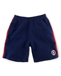 A preppy short rendered from soft cotton mesh is accented with side-seam stripes and a signature Ralph Lauren pony emblem, celebrating Team USA's participation in the 2012 Olympics. A preppy short rendered from soft cotton mesh is accented with side-seam stripes and a signature Ralph Lauren pony emblem, celebrating Team USA's participation in the 2012 Olympics.