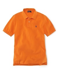 A timeless short-sleeved polo is crafted from breathable cotton mesh for an effortlessly handsome look. A timeless short-sleeved polo is crafted from breathable cotton mesh for an effortlessly handsome look.