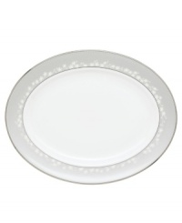 To entertain with grace and style look no further than this Bellina oval platter from Lenox's dinnerware and dishes collection. Elegant bone china with a delicate floral design and textured white beads is finished with platinum trim. Platter shown back. To entertain with grace and style look no further than this Bellina oval platter from Lenox's dinnerware and dishes collection. Elegant bone china with a delicate floral design and textured white beads is finished with platinum trim. Platter shown back.