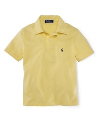 A short-sleeved polo is rendered in soft jersey-knit cotton for a classic look. A short-sleeved polo is rendered in soft jersey-knit cotton for a classic look.