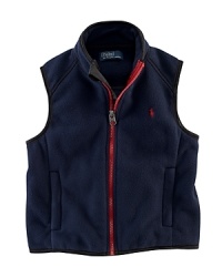 An essential vest is crafted from plush Polarfleece® for an ultra-soft feel and a cozy look. An essential vest is crafted from plush Polarfleece® for an ultra-soft feel and a cozy look.