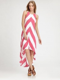 Bold chevron stripes pop on soft jersey in this asymmetric maxi shift.JewelneckSleevelessHem longer in backAbout 38 from natural waistRayonDry cleanMade in USAModel shown is 5'9 (175cm) wearing US size Small.