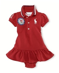 A preppy puff-sleeved polo dress in breathable stretch cotton mesh is accented with London embroidery to celebrate Team USA's participation in the 2012 Olympics. A preppy puff-sleeved polo dress in breathable stretch cotton mesh is accented with London embroidery to celebrate Team USA's participation in the 2012 Olympics.