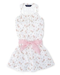 Absolutely charming dress in soft floral cotton jersey with a crocheted racerback silhouette and a pretty sash. Absolutely charming dress in soft floral cotton jersey with a crocheted racerback silhouette and a pretty sash.