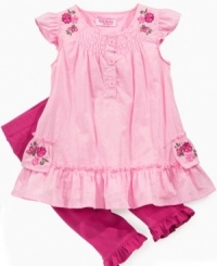 The perfect flower. Her blooming beauty will shine in this sweet tunic and legging set from Guess. The perfect flower. Her blooming beauty will shine in this sweet tunic and legging set from Guess.