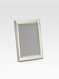 Classic and sophisticated in groove-trimmed sterling silver. From the Grooves CollectionFits vertical photographsMade in SpainDIMENSION INFORMATION4 X 6 (5 X 7 overall)5 X 7 (7 X 9 overall)8 X 10 (10 X 12 overall)FOR PERSONALIZATIONSelect a quantity, then scroll down and click on PERSONALIZE & ADD TO BAG to choose and preview your monogramming options. Please allow 2 weeks for delivery. Classic and sophisticated in groove-trimmed sterling silver. From the Grooves CollectionFits vertical photographsMade in SpainDIMENSION INFORMATION4 X 6 (5 X 7 overall)5 X 7 (7 X 9 overall)8 X 10 (10 X 12 overall)FOR PERSONALIZATIONSelect a quantity, then scroll down and click on PERSONALIZE & ADD TO BAG to choose and preview your monogramming options. Please allow 2 weeks for delivery.