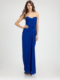 This floor-length silk silhouette features a prettily draped front ruffle and ruching at the back.Strapless sweetheart necklineAsymmetrical front rufflePick-up skirt detailBack ruchingConcealed back zipAbout 49 from natural waistFully lined92% silk/8% spandexDry cleanImportedModel shown is 5'11 (180cm) wearing US size 4.OUR FIT MODEL RECOMMENDS ordering true size. This floor-length silk silhouette features a prettily draped front ruffle and ruching at the back.Strapless sweetheart necklineAsymmetrical front rufflePick-up skirt detailBack ruchingConcealed back zipAbout 49 from natural waistFully lined92% silk/8% spandexDry cleanImportedModel shown is 5'11 (180cm) wearing US size 4.OUR FIT MODEL RECOMMENDS ordering true size.