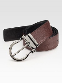 An adjustable, reversible dress look crafted in Italy from printed calfskin leather with a classic ruthenium buckle. About 1½ wide Leather Made in Italy An adjustable, reversible dress look crafted in Italy from printed calfskin leather with a classic ruthenium buckle. About 1½ wide Leather Made in Italy