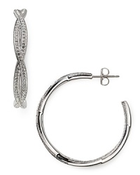 Nadri's intertwined pavé earrings perfect twinkle, with a twist. Don't reserve them for evening events: these haute hoops love to make a polished appearance, day and night. Nadri's intertwined pavé earrings perfect twinkle, with a twist. Don't reserve them for evening events: these haute hoops love to make a polished appearance, day and night.