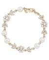 Stunning style is in bloom. Carolee combines imitation pearls and sparkling glass accents into a detailed floral-shaped pattern on this gorgeous link bracelet. Crafted in gold tone mixed metal. Approximate length: 7-1/2 inches.