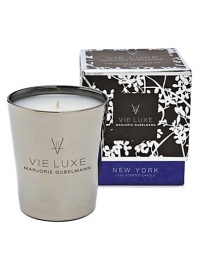 Experience the scent of Vetiver, warm amber and a touch of Olibanum oil. Created from all-natural beeswax combined with unique botanical waxes and the rarest and most seductive fine fragrance oils from around the world. Presented in nickel-finished glass. Burn time is approximately 60 hours.