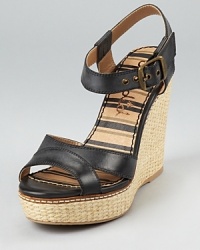 A summery, woven wedge is toughened up by edgy black leather on these Splendid wedges, a transitional style that seamlessly moves from uptown to downton. A summery, woven wedge is toughened up by edgy black leather on these Splendid wedges, a transitional style that seamlessly moves from uptown to downton.