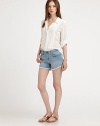 Your favorite denim cut-offs, sanded and faded for the perfect lived-in finish.THE FITRelaxed fitRise, about 8Inseam, about 2THE DETAILSZip flyFive-pocket style90% cotton/6% polyester/4% elastaneHand washMade in USA of imported fabricModel shown is 5'11 (180cm) wearing US size 4.