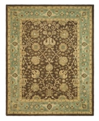 Alluring arabesques weave an inspiring design on this earth-toned area rug from Safavieh. Tufted in India from pure wool, this rug emerges from the annals of antiquity to bring spectacular style and time-honored quality to your home. (Clearance) Alluring arabesques weave an inspiring design on this earth-toned area rug from Safavieh. Tufted in India from pure wool, this rug emerges from the annals of antiquity to bring spectacular style and time-honored quality to your home. (Clearance)