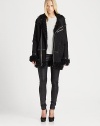 Soft, aviator-inspired leather jacket, defined by plush shearling, contrast trim and a length that hits below the hips.