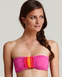 Smocked ruffles take on the color block trend on Becca's Sunrise Ruffle bikini top, a vibrant option for standing out on the seashore. Smocked ruffles take on the color block trend on Becca's Sunrise Ruffle bikini top, a vibrant option for standing out on the seashore.