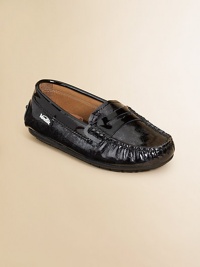 Crafted from buttery soft leather, this stylish pair features striking topstitching in a classic loafer silhouette.Slip-onPatent leather upperLeather liningRubber solePadded insoleImported