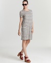 Exude California-cool style in a MARC BY MARC JACOBS stripe dress. Braided trim at the neckline and slit pocket with patch seam detail lend unique detail to this easygoing, go-to silhouette.