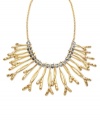 Branch out. Try something new with Alfani's statement-making bib necklace. Twisting branches in gold tone mixed metal sparkle with the addition of glass accents. Approximate length: 20 inches + 3-inch extender. Approximate drop: 2-1/2 inches.