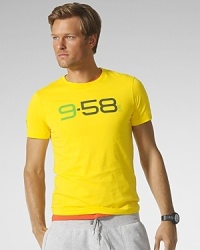 A short-sleeved crewneck T-shirt is crafted from lightweight cotton jersey with a race-inspired graphic print to bring out your competitive side. A short-sleeved crewneck T-shirt is crafted from lightweight cotton jersey with a race-inspired graphic print to bring out your competitive side.