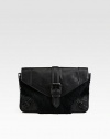 Lush rabbit fur adds textural appeal to this leather flap-top clutch with edgy buckled straps. Magnetic snap closureOne inside zip pocketTwo inside open pocketsCotton lining12½W X 8H X 1½DImported